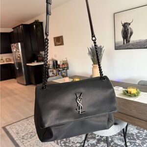 Saint Laurent YSL Grain De Poudre Medium
West Hollywood bag